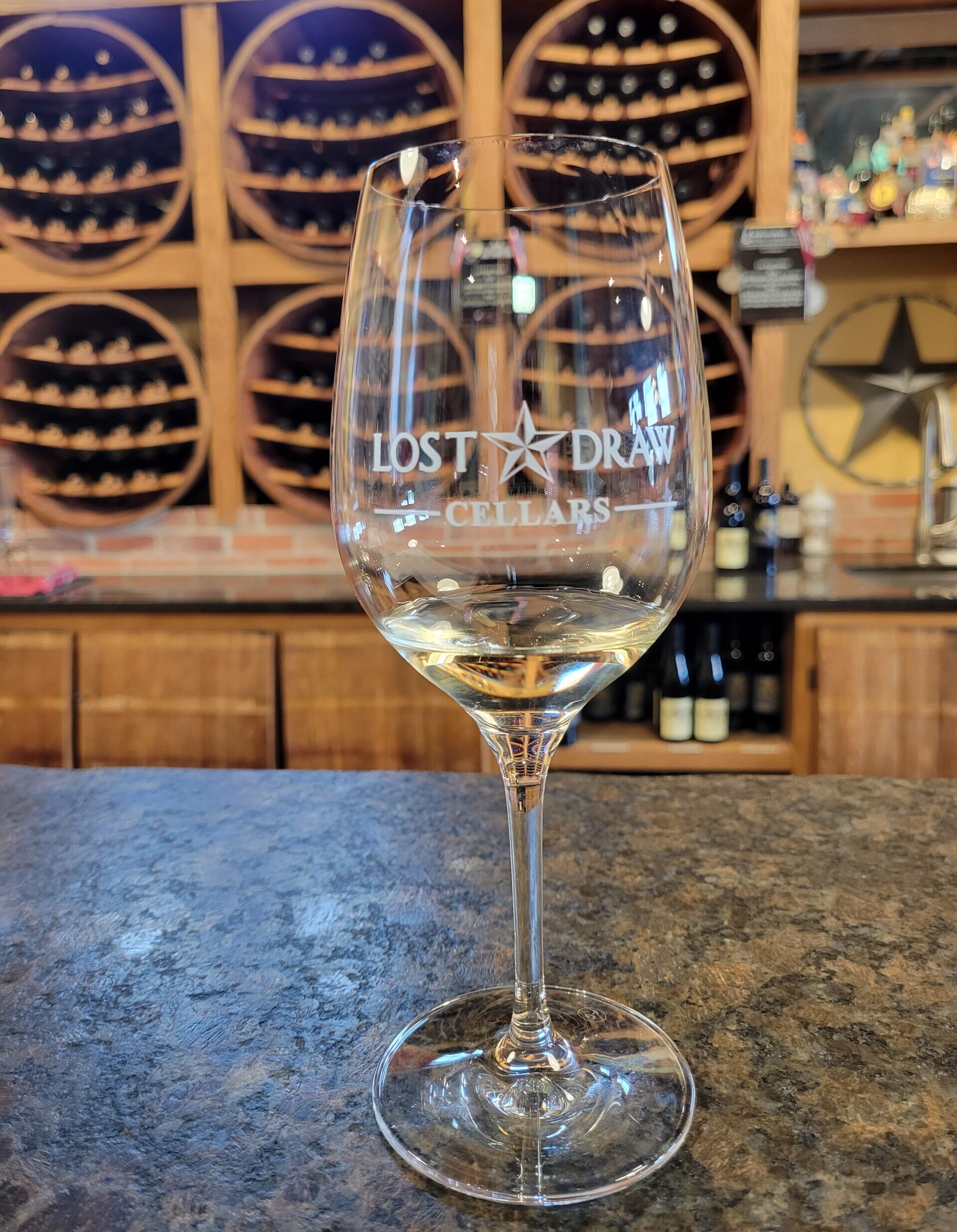 glass of white wine from Lost Draw Cellars